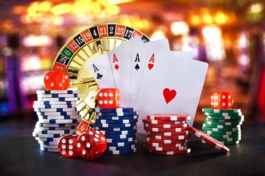 Live dealer at baccarat table with cards and chips